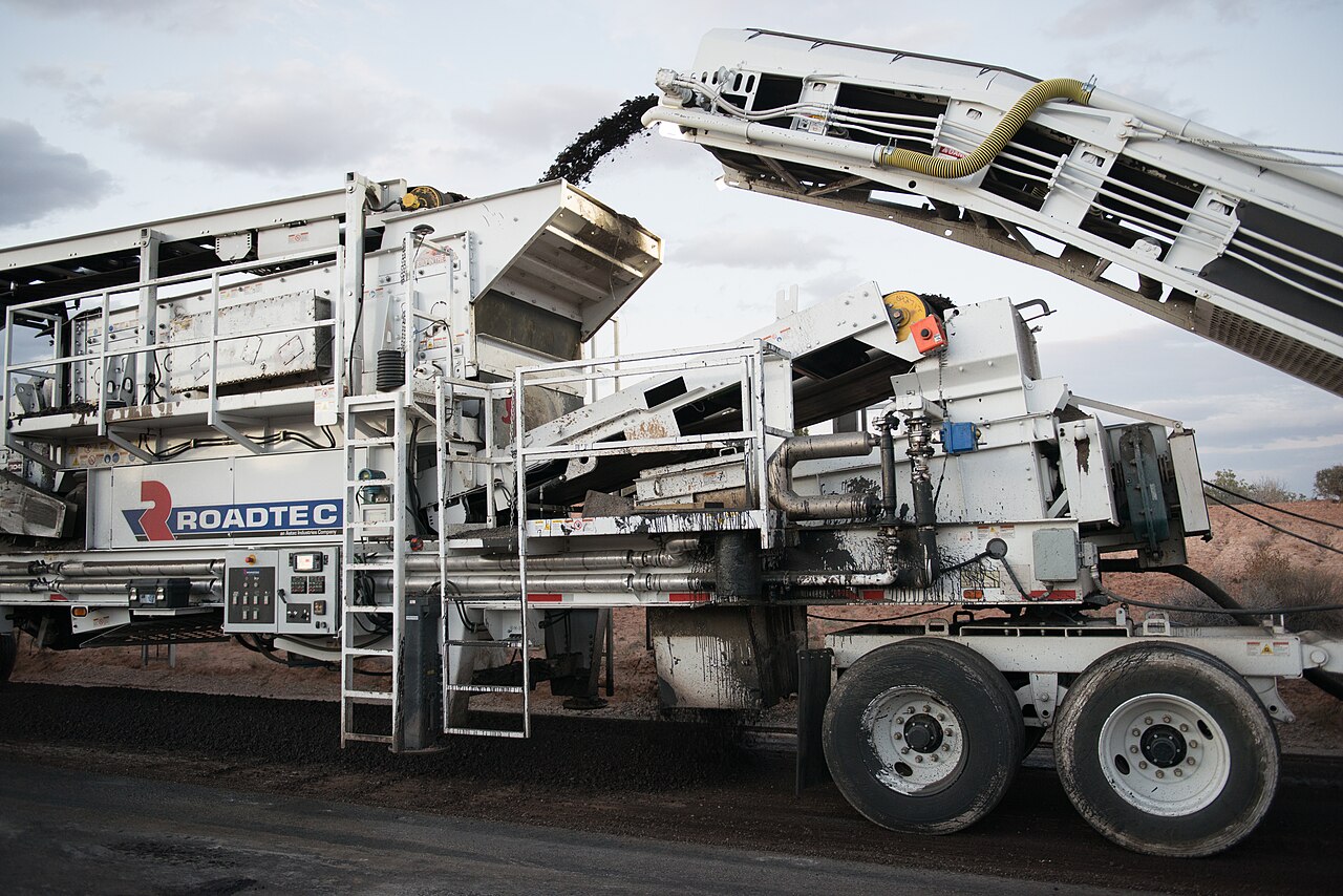 Cold-in-place recycling unit processing a road base